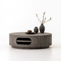 Mesa de centro redonda con hueco ovalado - gris